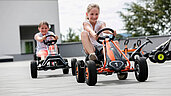 Kart fahren im Hof im Familienhotel Aigo welcome family in Oberösterreich